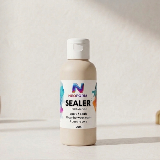 Bottle of Neoform Sealer on a neutral background with decorative items.